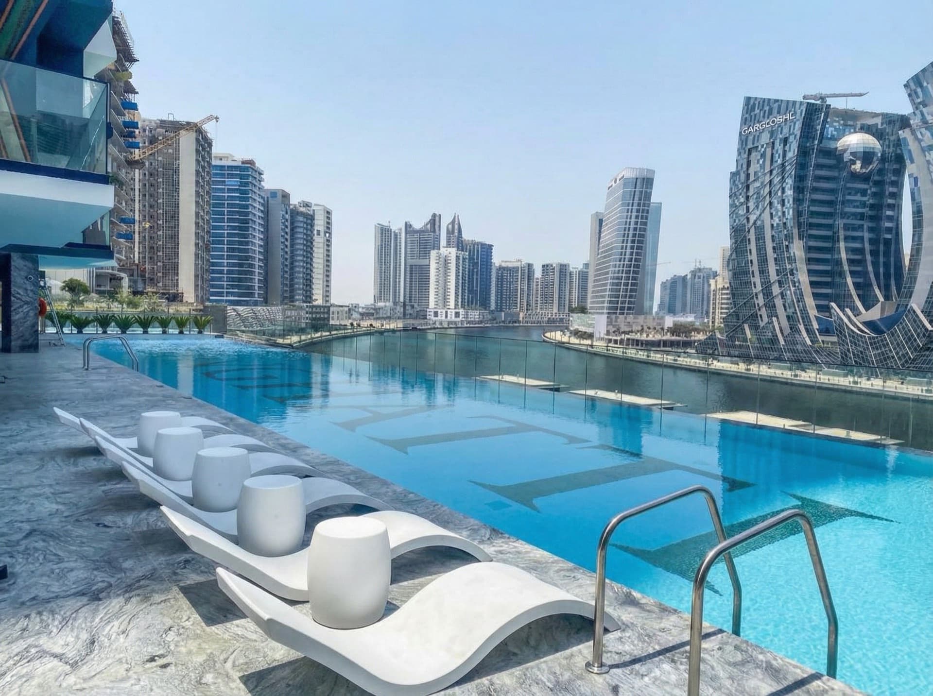 Infinity pool with Burj Khalifa view at Binghatti Canal